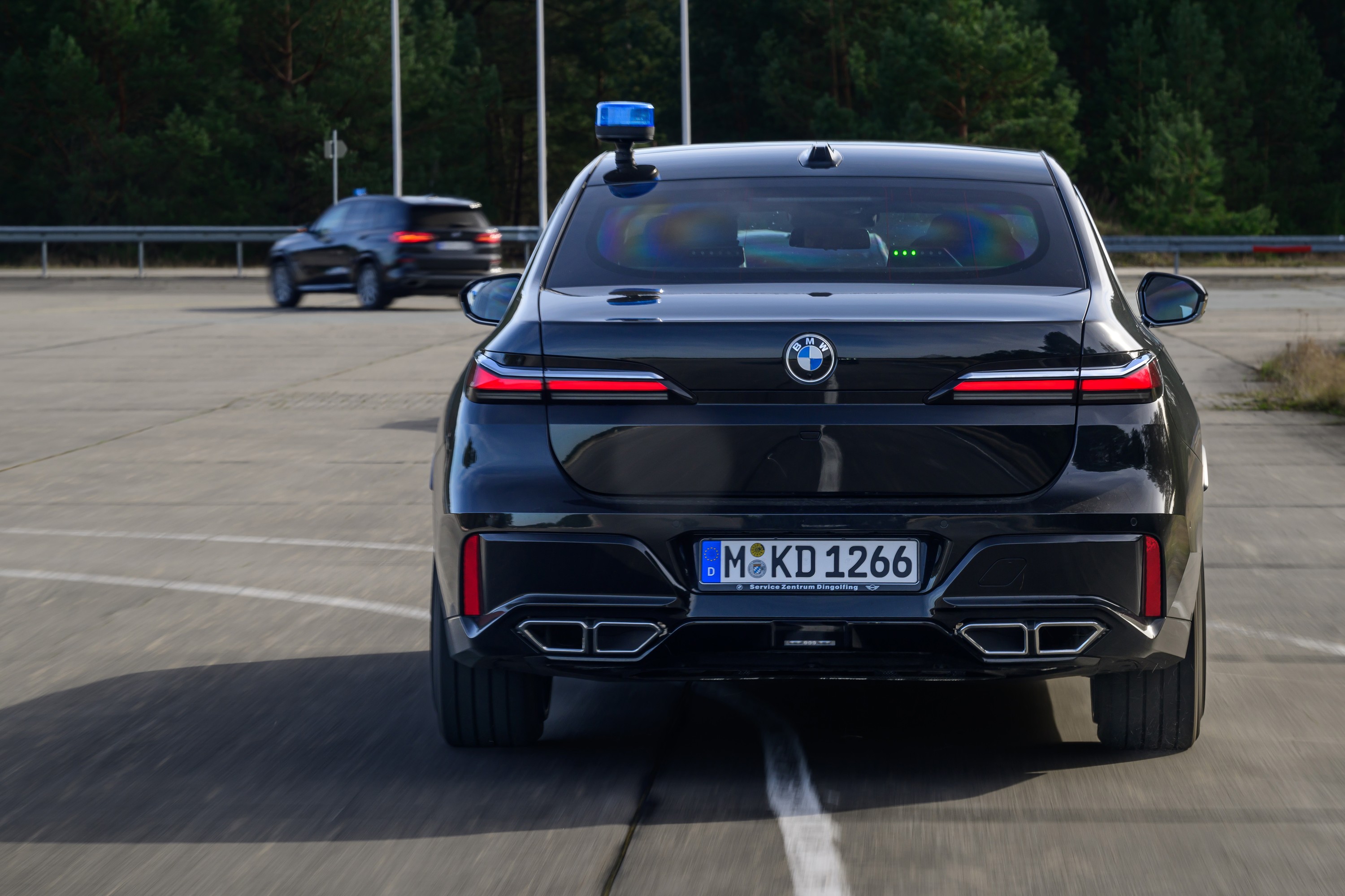 BMW 760i driving P90543768