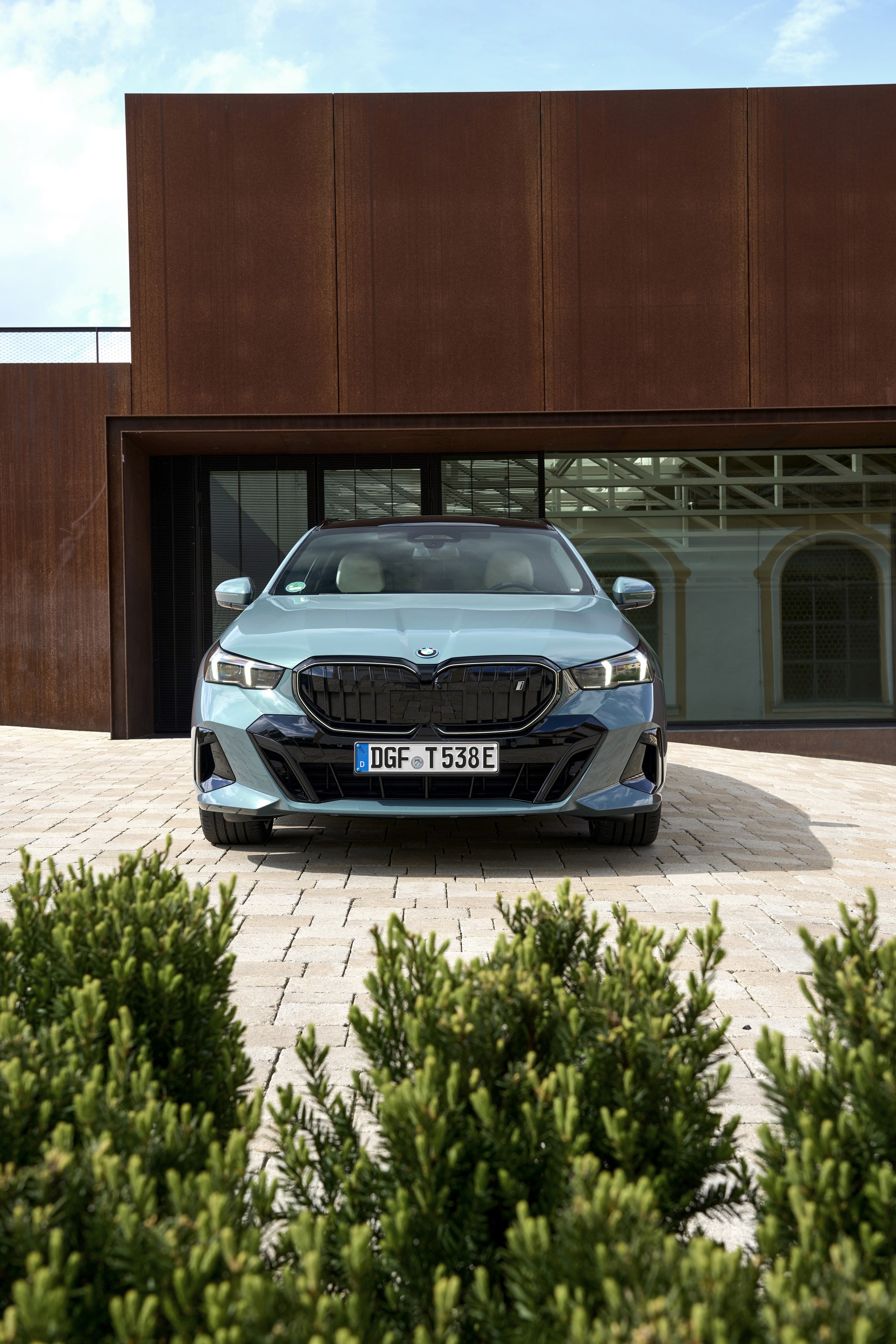BMW i5 driving P90550006