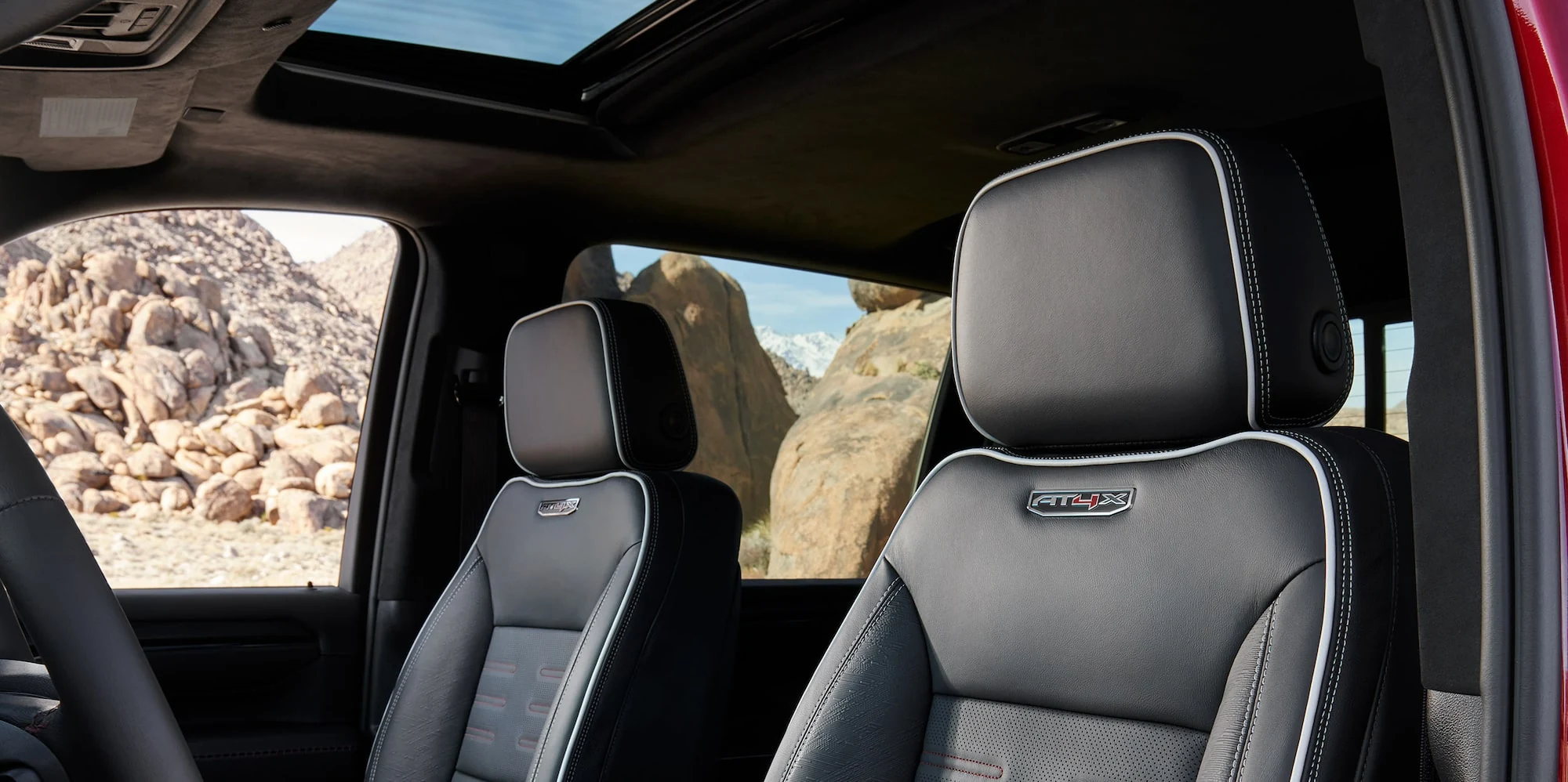 GMC Sierra HD AT4X front seating and sunroof