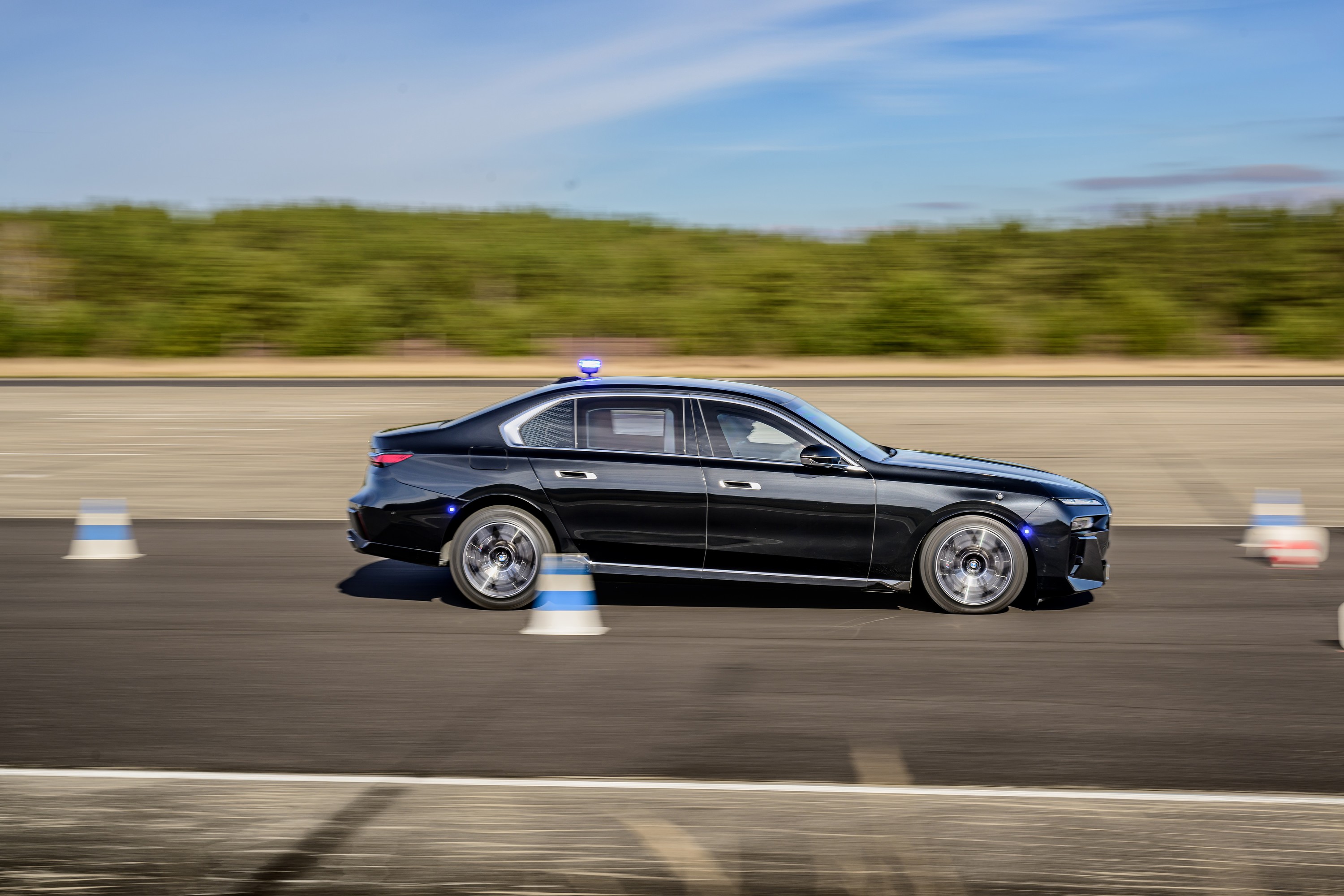 BMW 760i driving P90543773