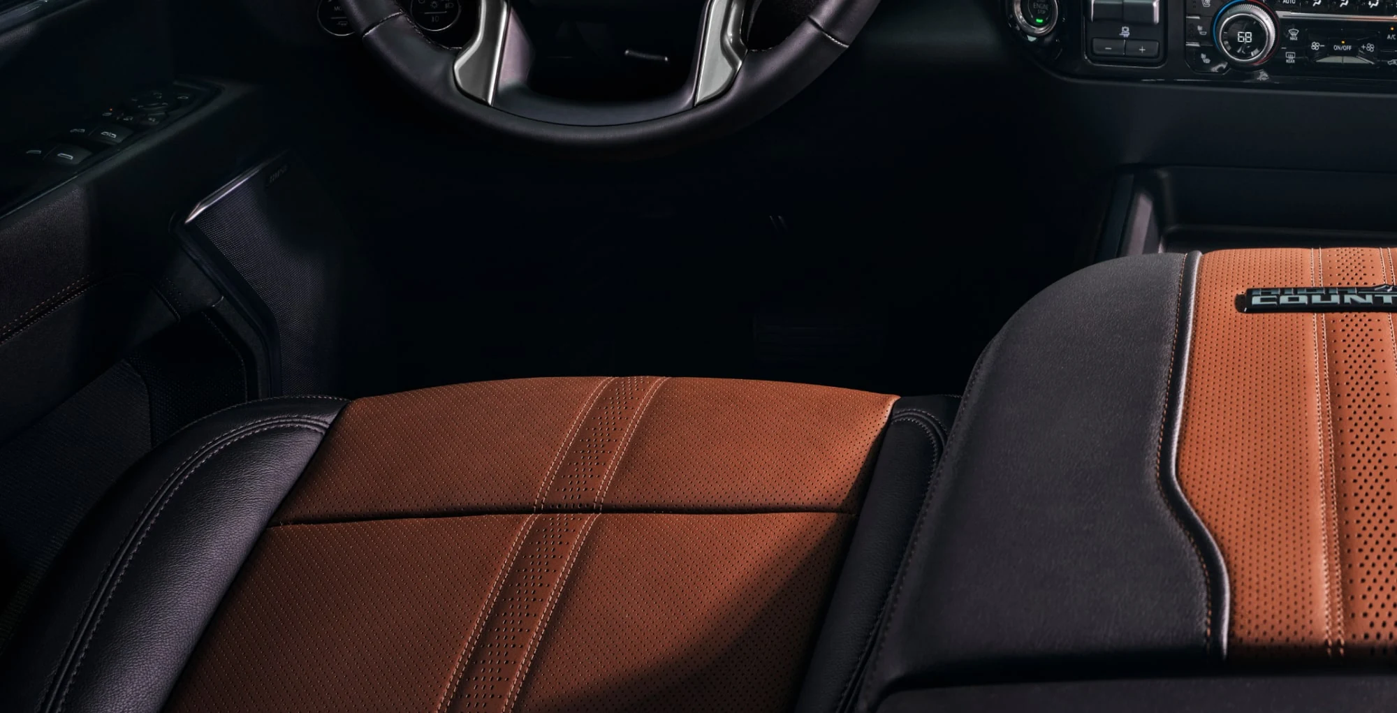 Chevrolet Silverado HD brown front seating and center console