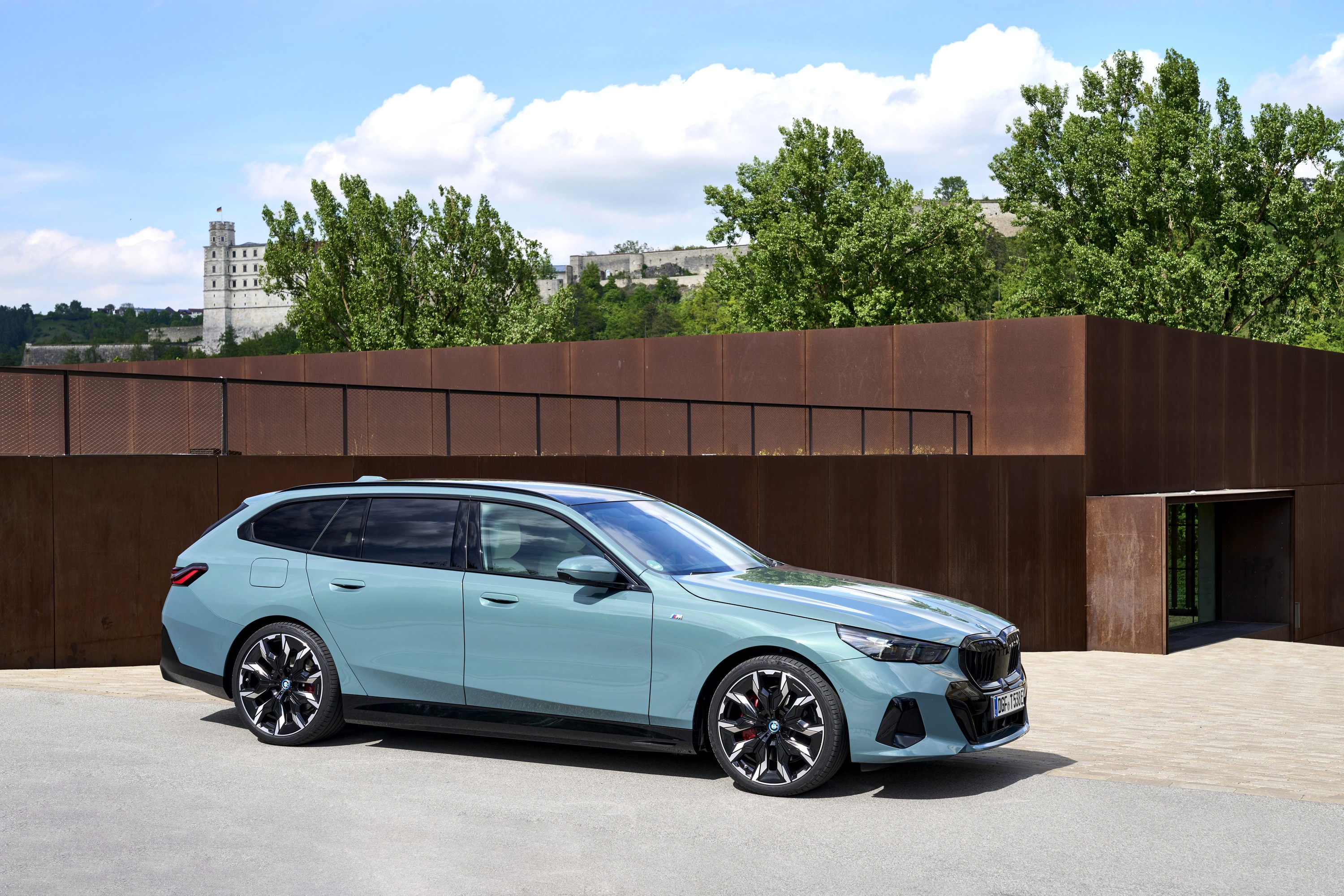 BMW i5 driving P90550007
